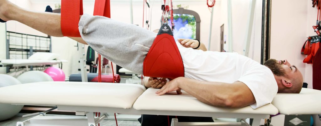 Exerciții NEURAC pe echipament Redcord